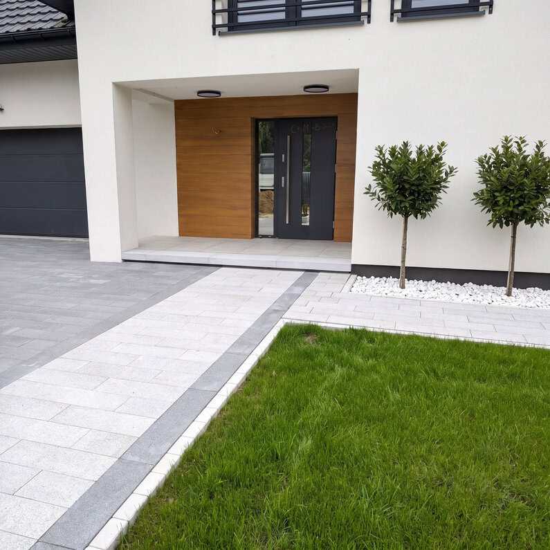 Trendy w kostce brukowej 2026: wielki format, ceramika 3 cm i stopnie lewitujące. Sprawdzamy, ile kosztuje nadążanie za modą | BLOG BUDOWLANY Trendy w kostce brukowej 2026: wielki format, ceramika 3 cm i stopnie lewitujące. Sprawdzamy, ile kosztuje nadążanie za modą | BLOG BUDOWLANY